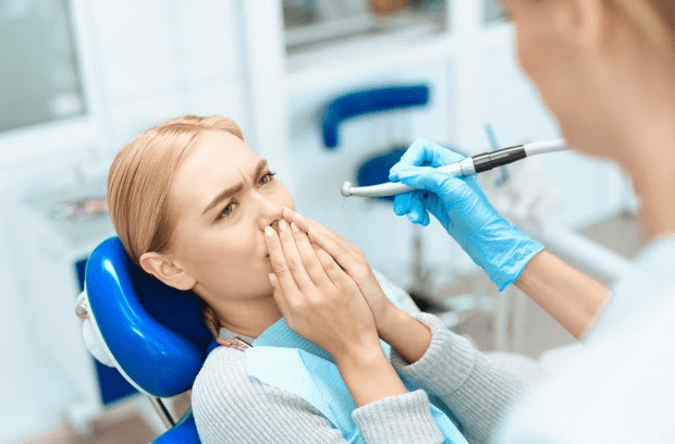 implante de dente dor
